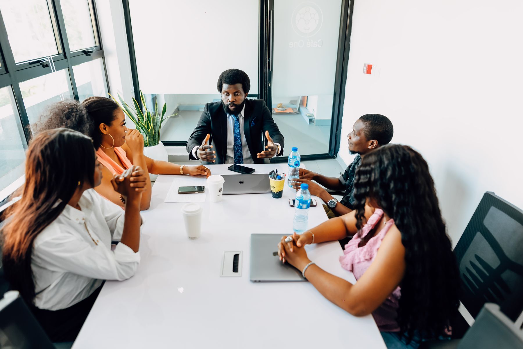 A team working together around a table in an African office.